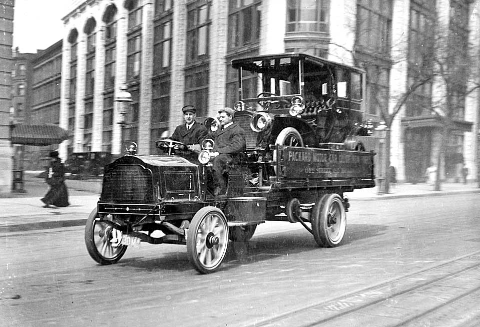 Circa-1910-Packard-Being-Delivered-On-A-Packard-Truck-I.jpg